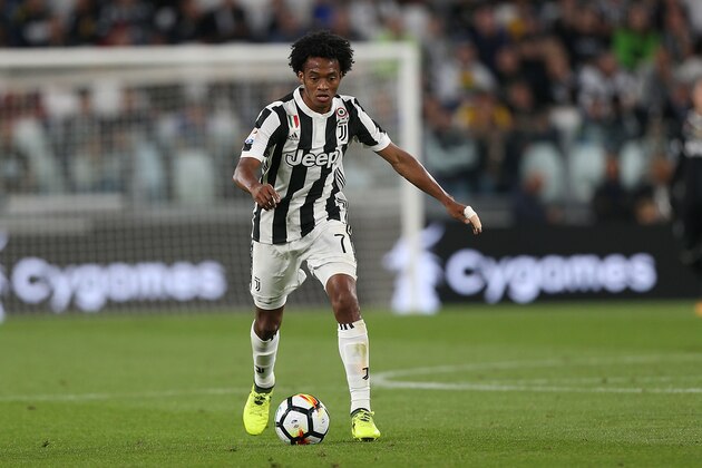 TURIN, ITALY - SEPTEMBER 20: Juan Cuadrado of Juventus in action during the Serie A match between Juventus and ACF Fiorentina on September 20, 2017 in Turin, Italy.  (Photo by Gabriele Maltinti/Getty Images)