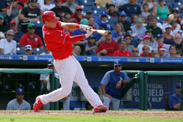 PHILADELPHIA, PA - SEPTEMBER 21: Rhys Hoskins #17 of the Philadelphia Phillies hits a two-run double in the fifth inning during a game against the Los Angeles Dodgers at Citizens Bank Park on September 21, 2017 in Philadelphia, Pennsylvania. (Photo by Hunter Martin/Getty Images)