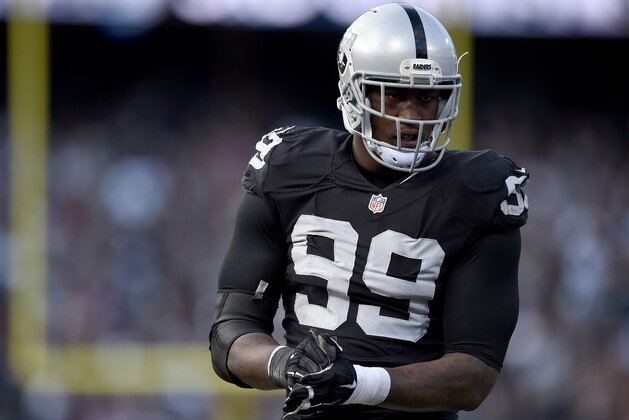 OAKLAND, CA - NOVEMBER 15: Aldon Smith #99 of the Oakland Raiders looks on during a timeout against the Minnesota Vikings in the third quarter of their NFL football game at O.co Coliseum on November 15, 2015 in Oakland, California. (Photo by Thearon W. Henderson/Getty Images) OAKLAND, CA - NOVEMBER 15: Aldon Smith #99 of the Oakland Raiders looks on during a timeout against the Minnesota Vikings in the third quarter of their NFL football game at O.co Coliseum on November 15, 2015 in Oakland, California. (Photo by Thearon W. Henderson/Getty Images)