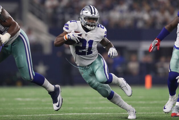 Sep 10, 2017; Arlington, TX, USA; Dallas Cowboys running back Ezekiel Elliott (21) runs with the ball against the New York Giants at AT&T Stadium. Mandatory Credit: Matthew Emmons-USA TODAY Sports
