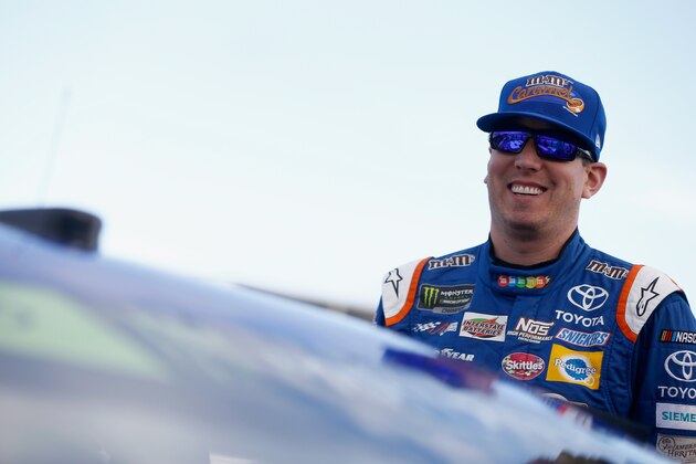 LOUDON, NH - SEPTEMBER 22:  Kyle Busch, driver of the #18 M&M's Caramel Toyota, stands on the grid during qualifying for the Monster Energy NASCAR Cup Series ISM Connect 300 at New Hampshire Motor Speedway on September 22, 2017 in Loudon, New Hampshire.  (Photo by Jeff Zelevansky/Getty Images)
