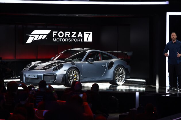Dan Greenawalt introduces the 2018 Porsche 911 GT2 RS and the Forza Motorsport 7 game  during the Microsoft Xbox E3 2017 Briefing, June 11, 2017 at the Galen Center in Los Angeles, California. 
The Electronic Entertainment Expo (E3), which focuses on new products and technologies in electronic gaming systems and interactive entertainment, takes places June 13-15 at the Los Angeles Convention Center. / AFP PHOTO / Robyn BECK        (Photo credit should read ROBYN BECK/AFP/Getty Images)