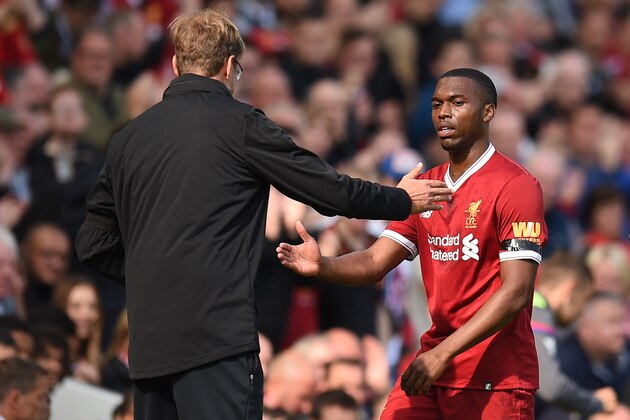 Liverpool's German manager Jurgen Klopp (L) shakes hands with Liverpool's English striker Daniel Sturridge as he is substituted during the English Premier League football match between Liverpool and Crystal Palace at Anfield in Liverpool, north west England on August 19, 2017. / AFP PHOTO / Oli SCARFF / RESTRICTED TO EDITORIAL USE. No use with unauthorized audio, video, data, fixture lists, club/league logos or 'live' services. Online in-match use limited to 75 images, no video emulation. No use in betting, games or single club/league/player publications.  /         (Photo credit should read OLI SCARFF/AFP/Getty Images)
