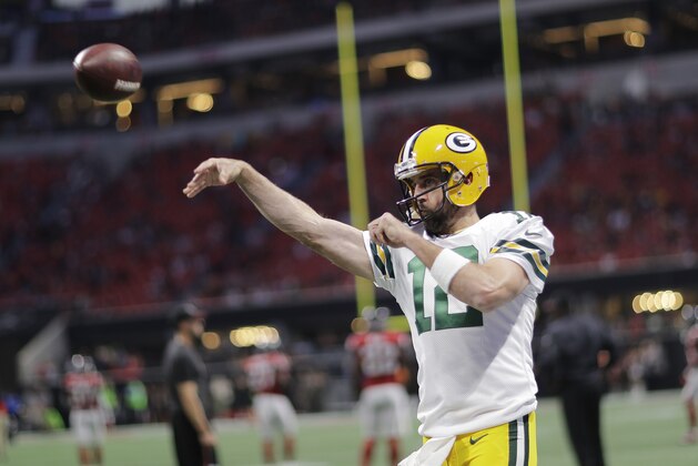 Green Bay Packers quarterback Aaron Rodgers (12) warms up before the first of an NFL football game between the Atlanta Falcons and the Green Bay Packers, Sunday, Sept. 17, 2017, in Atlanta. (AP Photo/David Goldman)