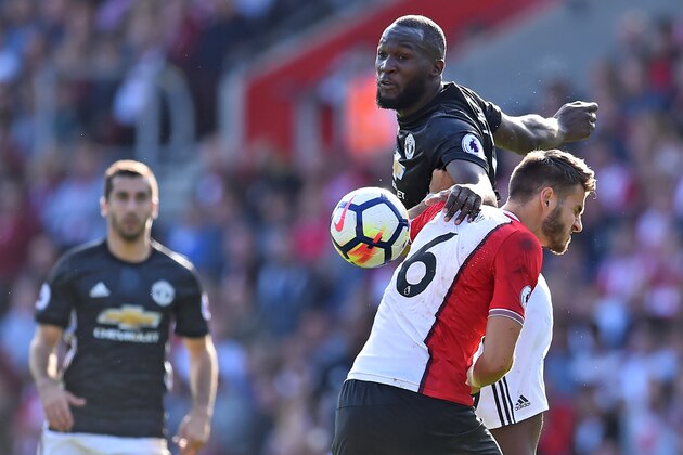 Southampton's Dutch defender Wesley Hoedt (R) vies with Manchester United's Belgian striker Romelu Lukaku during the English Premier League football match between Southampton and Manchester United at St Mary's Stadium in Southampton, southern England on September 23, 2017. / AFP PHOTO / Glyn KIRK / RESTRICTED TO EDITORIAL USE. No use with unauthorized audio, video, data, fixture lists, club/league logos or 'live' services. Online in-match use limited to 75 images, no video emulation. No use in betting, games or single club/league/player publications.  /         (Photo credit should read GLYN KIRK/AFP/Getty Images)