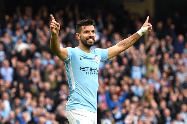 Manchester City's Argentinian striker Sergio Aguero celebrates after scoring their fourth goal during the English Premier League football match between Manchester City and Crystal Palace at the Etihad Stadium in Manchester, north west England, on September 23, 2017. / AFP PHOTO / Oli SCARFF / RESTRICTED TO EDITORIAL USE. No use with unauthorized audio, video, data, fixture lists, club/league logos or 'live' services. Online in-match use limited to 75 images, no video emulation. No use in betting, games or single club/league/player publications.  /         (Photo credit should read OLI SCARFF/AFP/Getty Images)