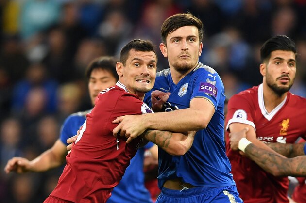 LEICESTER, ENGLAND - SEPTEMBER 23:  Dejan Lovren of Liverpool and Harry Maguire of Leicester City in action during the Premier League match between Leicester City and Liverpool at The King Power Stadium on September 23, 2017 in Leicester, England.  (Photo by Laurence Griffiths/Getty Images)