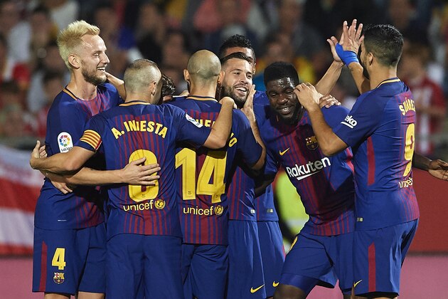 GIRONA, SPAIN - SEPTEMBER 23:  Jordi Alba of Barcelona celebrates scoring his team's first goal with his teammates during the La Liga match between Girona and Barcelona at Municipal de Montilivi Stadium on September 23, 2017 in Girona, Spain.  (Photo by Manuel Queimadelos Alonso/Getty Images)