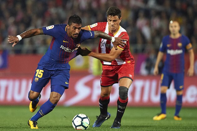 GIRONA, SPAIN - SEPTEMBER 23:  Pablo Maffeo (R) of Girona competes for the ball with Paulinho of Barcelona during the La Liga match between Girona and Barcelona at Municipal de Montilivi Stadium on September 23, 2017 in Girona, Spain.  (Photo by Manuel Queimadelos Alonso/Getty Images)