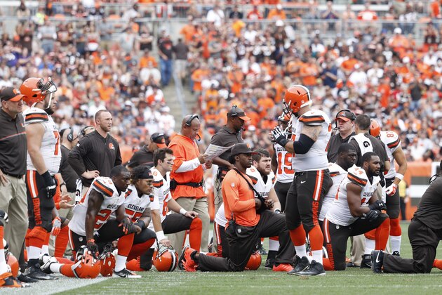 CLEVELAND, OH - SEPTEMBER 18: Cleveland Browns players kneel as an injured player is tended to during the game against the Baltimore Ravens at FirstEnergy Stadium on September 18, 2016 in Cleveland, Ohio. The Ravens defeated the Browns 25-20. (Photo by Joe Robbins/Getty Images) *** Local Caption ***