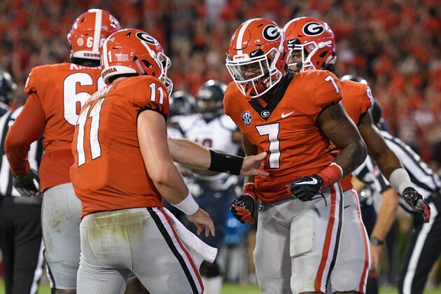 Sep 16, 2017; Athens, GA, USA; Georgia Bulldogs running back D'Andre Swift (7) reacts  with quarterback Jake Fromm (11) after running for a touchdown against the Samford Bulldogs during the second half at Sanford Stadium. Mandatory Credit: Dale Zanine-USA TODAY Sports