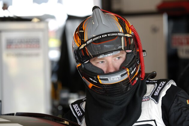 Tyler Reddick climbs into his car before a practice session for the NASCAR Xfinity Series auto race, Friday, June 23, 2017, at Iowa Speedway in Newton, Iowa. (AP Photo/Charlie Neibergall)