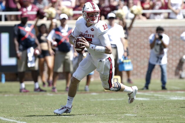 TALLAHASSEE, FL - SEPTEMBER 23: Quarterback Ryan Finley #15 of the North Carolina State Wolfpack on a pass play during the game against the Florida State Seminoles at Doak Campbell Stadium on Bobby Bowden Field on September 23, 2017 in Tallahassee, Florida. NC State defeated Florida State 27 to 21. (Photo by Don Juan Moore/Getty Images)