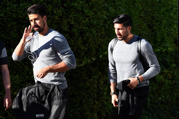 Germany's midfielder Emre Can(R) and Sami Khedira arrive at the Hotel Giardano in Ascona, on May 24, 2016, at the start of German national football team preparation for the Euro 2016 European football championships. / AFP / PATRIK STOLLARZ        (Photo credit should read PATRIK STOLLARZ/AFP/Getty Images)