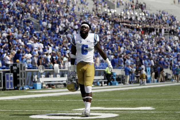 UCLA defensive back Adarius Pickett leaves the field after UCLA lost to Memphis 48-45 in an NCAA college football game Saturday, Sept. 16, 2017, in Memphis, Tenn. (AP Photo/Mark Humphrey)