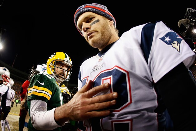 GREEN BAY, WI - NOVEMBER 30:  Quarterback Tom Brady #12 of the New England Patriots walks away from Aaron Rodgers #12 of the Green Bay Packers after shaking hands following the NFL game at Lambeau Field on November 30, 2014 in Green Bay, Wisconsin. The Packers defeated the Patriots 26-21.  (Photo by Christian Petersen/Getty Images)