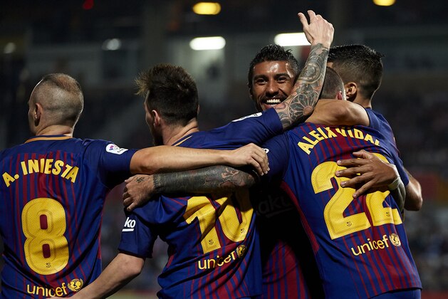 GIRONA, SPAIN - SEPTEMBER 23:  Paulinho of Barcelona celebrates with his teammates during the La Liga match between Girona and Barcelona at Municipal de Montilivi Stadium on September 23, 2017 in Girona, Spain.  (Photo by Manuel Queimadelos Alonso/Getty Images)