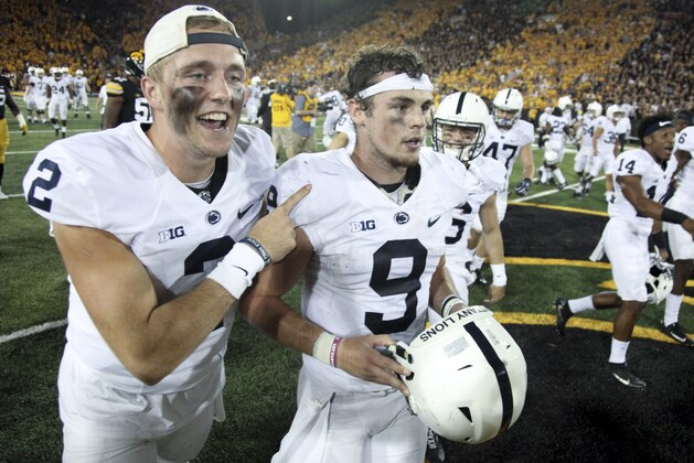 IOWA CITY, IOWA- SEPTEMBER 23:  Quarterbacks Tommy Stevens #2 and Trace McSorley #9 of the Penn State Nittany Lions celebrate after defeating the Iowa Hawkeyes on September 23, 2017 at Kinnick Stadium in Iowa City, Iowa.  (Photo by Matthew Holst/Getty Images)