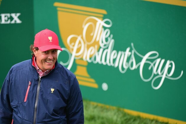 INCHEON, SOUTH KOREA - OCTOBER 11:  Phil Mickelson of the United States Team smiles on the second tee after a birdie to win the first hole over Charl Schwartzel of the International Team during the Sunday singles matches at The Presidents Cup at Jack Nicklaus Golf Club Korea on October 11, 2015 in Songdo IBD, Incheon City, South Korea.  (Photo by Harry How/Getty Images)