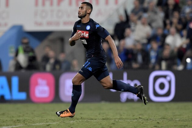 Napoli's French defender Faouzi Ghoulam celebrates after scoring a goal during the Serie A football match between Spal and Napoli at Paolo Mazza Stadium in Ferrara on September 23, 2017.  / AFP PHOTO / TIZIANA FABI        (Photo credit should read TIZIANA FABI/AFP/Getty Images)