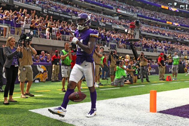 MINNEAPOLIS, MN - SEPTEMBER 24: Stefon Diggs #14 of the Minnesota Vikings celebrates a touchdown in the second quarter of the game agains the Tampa Bay Buccaneers on September 24, 2017 at U.S. Bank Stadium in Minneapolis, Minnesota. (Photo by Adam Bettcher/Getty Images)