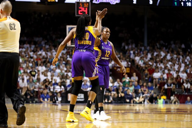 MINNEAPOLIS, MN - SEPTEMBER 24: Chelsea Gray #12 and Nneka Ogwumike #30 of the Los Angeles Sparks high five each other during the game against the Minnesota Lynx in Game One of the 2017 WNBA Finals on September 24, 2017 at University of Minnesota Williams Arena in Minneapolis, Minnesota.  NOTE TO USER: User expressly acknowledges and agrees that, by downloading and or using this Photograph, user is consenting to the terms and conditions of the Getty Images License Agreement. Mandatory Copyright Notice: Copyright 2017 NBAE (Photo by Jordan Johnson/NBAE via Getty Images)