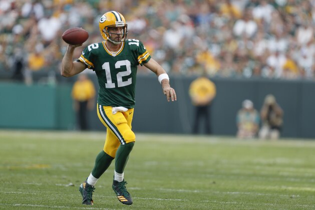 Green Bay Packers' Aaron Rodgers throws during the second half of an NFL football game against the Cincinnati Bengals Sunday, Sept. 24, 2017, in Green Bay, Wis. (AP Photo/Matt Ludtke)