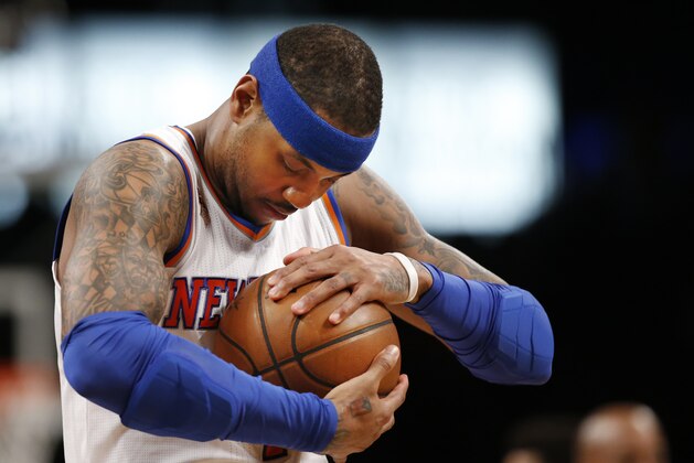 New York Knicks forward Carmelo Anthony rubs up the ball during pregame warmups before the start of an NBA basketball game against the Brooklyn Nets, Sunday, March 12, 2017, in New York. (AP Photo/Kathy Willens)