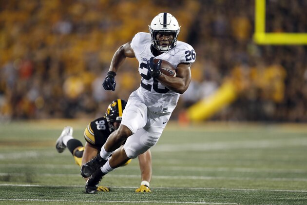 Penn State running back Saquon Barkley runs with the ball during the first half of an NCAA college football game against Iowa Saturday, Sept. 23, 2017, in Iowa City, Iowa. (AP Photo/Jeff Roberson)