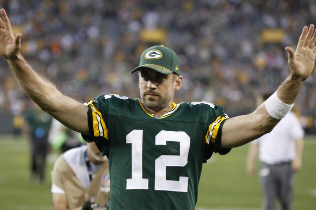 Green Bay Packers' Aaron Rodgers celebrates after an NFL football game against the Cincinnati Bengals Sunday, Sept. 24, 2017, in Green Bay, Wis. The Packers won 27-24 in overtime. (AP Photo/Mike Roemer)