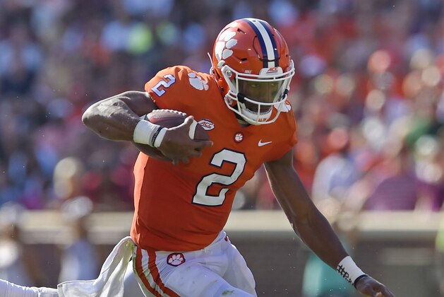 Clemson's Kelly Bryant charges forward for a first down during the first half of an NCAA college football game against Boston College Saturday, Sept. 23, 2017, in Clemson, S.C. (AP Photo/Richard Shiro)