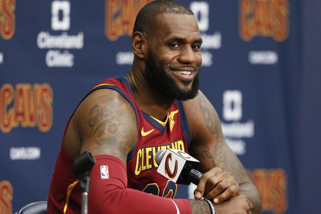 Cleveland Cavaliers' LeBron James answers questions during the NBA basketball team media day, Monday, Sept. 25, 2017, in Independence, Ohio. (AP Photo/Ron Schwane)
