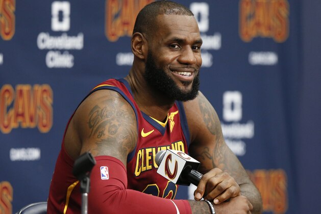 Cleveland Cavaliers' LeBron James answers questions during the NBA basketball team media day, Monday, Sept. 25, 2017, in Independence, Ohio. (AP Photo/Ron Schwane)
