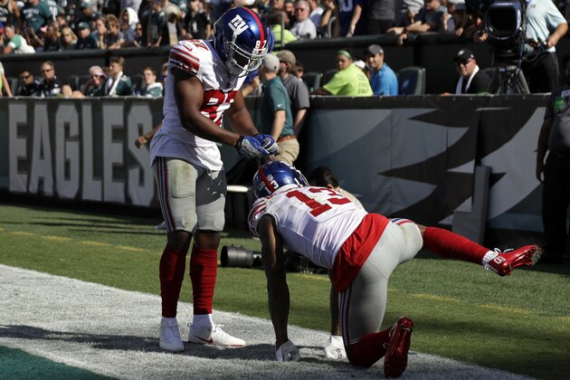 New York Giants' Odell Beckham, right, celebrates with Sterling Shepard after a touchdown during the second half of an NFL football game against the Philadelphia Eagles, Sunday, Sept. 24, 2017, in Philadelphia. (AP Photo/Michael Perez)