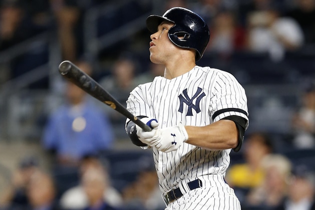 New York Yankees' Aaron Judge (99) watches his first-inning, solo home run off Minnesota Twins starting pitcher Ervin Santana in a baseball game against the Twins in New York, Monday, Sept. 18, 2017. (AP Photo/Kathy Willens) New York Yankees' Aaron Judge (99) watches his first-inning, solo home run off Minnesota Twins starting pitcher Ervin Santana in a baseball game against the Twins in New York, Monday, Sept. 18, 2017. (AP Photo/Kathy Willens)