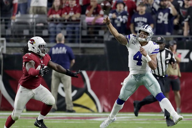 Dallas Cowboys quarterback Dak Prescott (4) throws as Arizona Cardinals outside linebacker Markus Golden (44) pursues during the second half of an NFL football game, Monday, Sept. 25, 2017, in Glendale, Ariz. (AP Photo/Rick Scuteri)