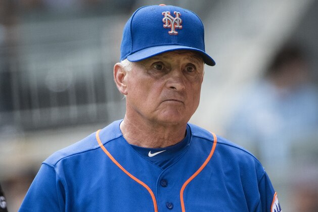 New York Mets manager Terry Collins (10) comes back to the dugout after talking to an umpire during the ninth inning of a baseball game against the Atlanta Braves, Sunday, June 11, 2017, in Atlanta. New York won 2-1. (AP Photo/John Amis)