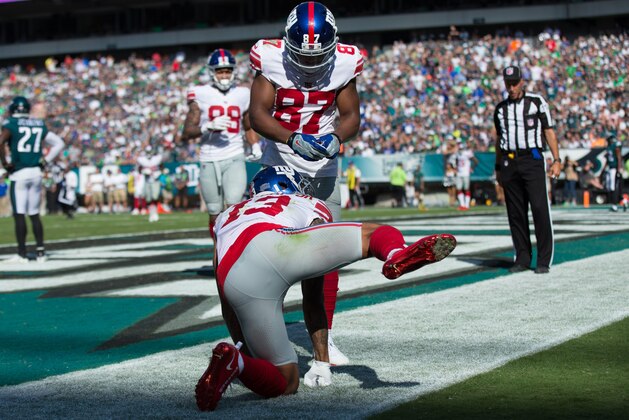 Sep 24, 2017; Philadelphia, PA, USA; New York Giants wide receiver Odell Beckham (13) gestures after scoring a touchdown and is penalized during the fourth quarter against the Philadelphia Eagles at Lincoln Financial Field. Mandatory Credit: Bill Streicher-USA TODAY Sports