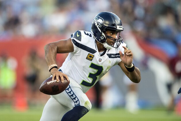 NASHVILLE, TN - SEPTEMBER 24: Quarterback Russell Wilson #3 of the Seattle Seahawks scrambles against the Tennessee Titans during a NFL game at Nissan Stadium on September 24, 2017 in Nashville, Tennessee.  (Photo by Ronald C. Modra/Sports Imagery/Getty Images)
