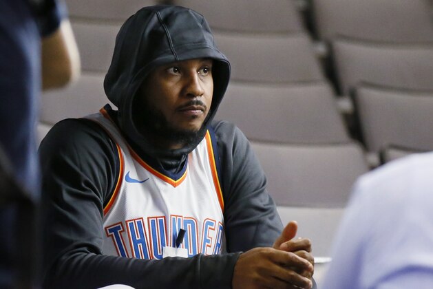 Oklahoma City Thunder forward Carmelo Anthony waits for an interview to begin during an NBA basketball media day in Oklahoma City, Monday, Sept. 25, 2017. (AP Photo/Sue Ogrocki)
