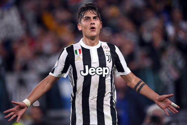 Juventus's forward from Argentina Paulo Dybala celebrates after scoring a goal during the italian Serie A football match Juventus vs Torino in Turin on September 23, 2017.  / AFP PHOTO / FILIPPO MONTEFORTE        (Photo credit should read FILIPPO MONTEFORTE/AFP/Getty Images)