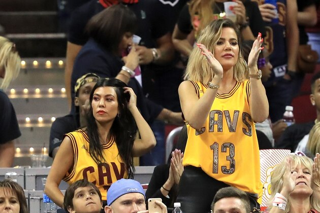 CLEVELAND, OH - JUNE 09:  TV personalities Kourtney Kardashian and Khloe Kardashian attend Game 4 of the 2017 NBA Finals between the Golden State Warriors and the Cleveland Cavaliers at Quicken Loans Arena on June 9, 2017 in Cleveland, Ohio. NOTE TO USER: User expressly acknowledges and agrees that, by downloading and or using this photograph, User is consenting to the terms and conditions of the Getty Images License Agreement.  (Photo by Ronald Martinez/Getty Images)