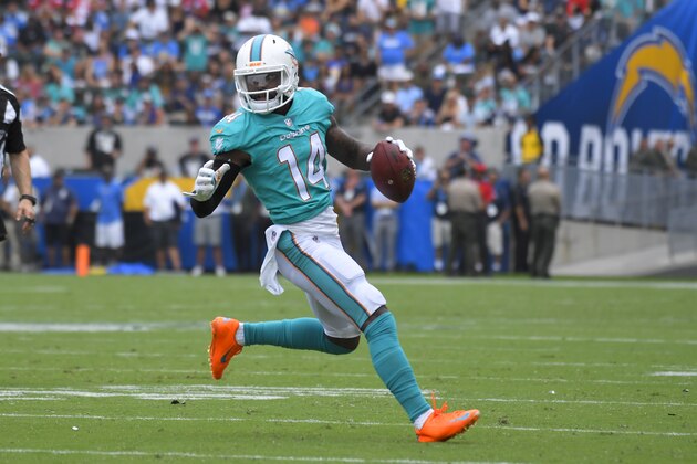 Miami Dolphins wide receiver Jarvis Landry (14) runs with the ball during the first half of an NFL football game against the Los Angeles Chargers Sunday, Sept. 17, 2017, in Carson, Calif. (AP Photo/Mark J. Terrill)