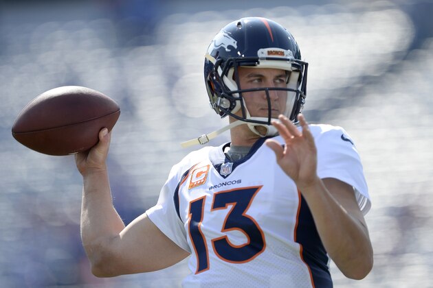 Denver Broncos quarterback Trevor Siemian works out prior to an NFL football game against the Buffalo Bills, Sunday, Sept. 24, 2017, in Orchard Park, N.Y. (AP Photo/Adrian Kraus)