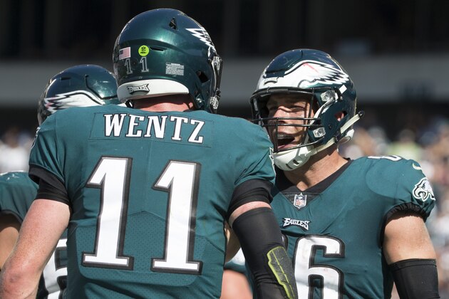 PHILADELPHIA, PA - SEPTEMBER 24: Carson Wentz #11 of the Philadelphia Eagles celebrates with Zach Ertz #86 after scoring a touchdown in the third quarter against the New York Giants at Lincoln Financial Field on September 24, 2017 in Philadelphia, Pennsylvania. The Eagles defeated the Giants 27-24. (Photo by Mitchell Leff/Getty Images)