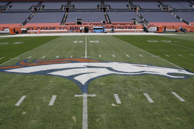 The Denver Broncos logo is painted on the field at Mile High Stadium prior to an NFL football game against the Los Angeles Chargers, Monday, Sept. 11, 2017, in Denver. (AP Photo/Jack Dempsey)