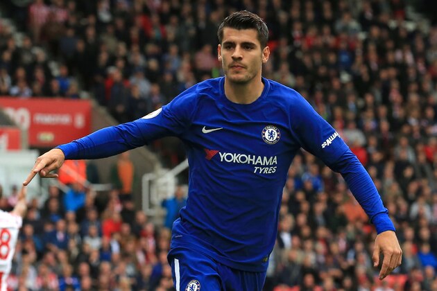 Chelsea's Spanish striker Alvaro Morata celebrates scoring the opening goal of the English Premier League football match between Stoke City and Chelsea at the Bet365 Stadium in Stoke-on-Trent, central England on September 23, 2017. / AFP PHOTO / Lindsey PARNABY / RESTRICTED TO EDITORIAL USE. No use with unauthorized audio, video, data, fixture lists, club/league logos or 'live' services. Online in-match use limited to 75 images, no video emulation. No use in betting, games or single club/league/player publications.  /         (Photo credit should read LINDSEY PARNABY/AFP/Getty Images)