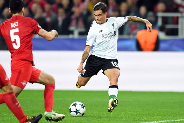 Liverpool's midfielder from Brazil Philippe Coutinho Correia shoots to score a goal during the UEFA Champions League Group E football match between FC Spartak Moscow and Liverpool FC at the Otkrytie Arena stadium in Moscow on September 26, 2017. / AFP PHOTO / Kirill KUDRYAVTSEV        (Photo credit should read KIRILL KUDRYAVTSEV/AFP/Getty Images)