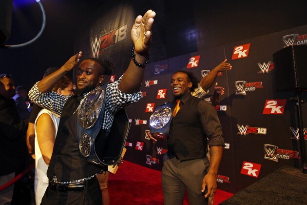 WWE Superstars The New Day are seen at the WWE 2K18 SummerSlam Kickoff Event on Friday, Aug. 18, 2017, in New York. (Photo by Adam Hunger/Invision for 2K Games/AP Images) WWE Superstars The New Day are seen at the WWE 2K18 SummerSlam Kickoff Event on Friday, Aug. 18, 2017, in New York. (Photo by Adam Hunger/Invision for 2K Games/AP Images)