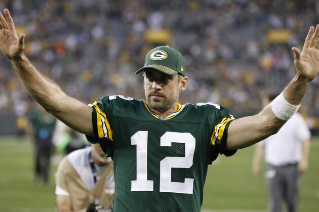 Green Bay Packers' Aaron Rodgers celebrates after an NFL football game against the Cincinnati Bengals Sunday, Sept. 24, 2017, in Green Bay, Wis. The Packers won 27-24 in overtime. (AP Photo/Mike Roemer)